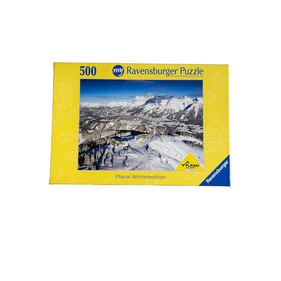 Puzzle box shows snowy Planai with cable cars, pine trees and mountain range in the background, 500 pieces | © Planai-Hochwurzen-Bahnen GmbH